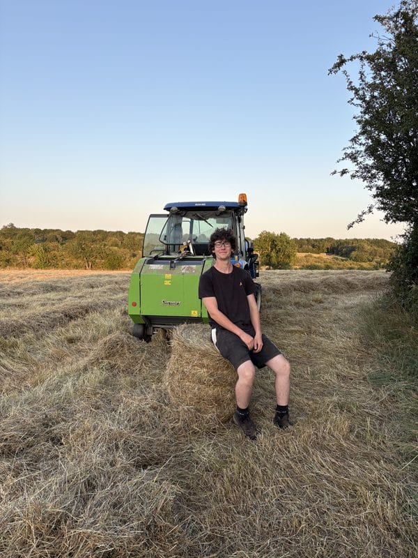 The first bale of hay made.